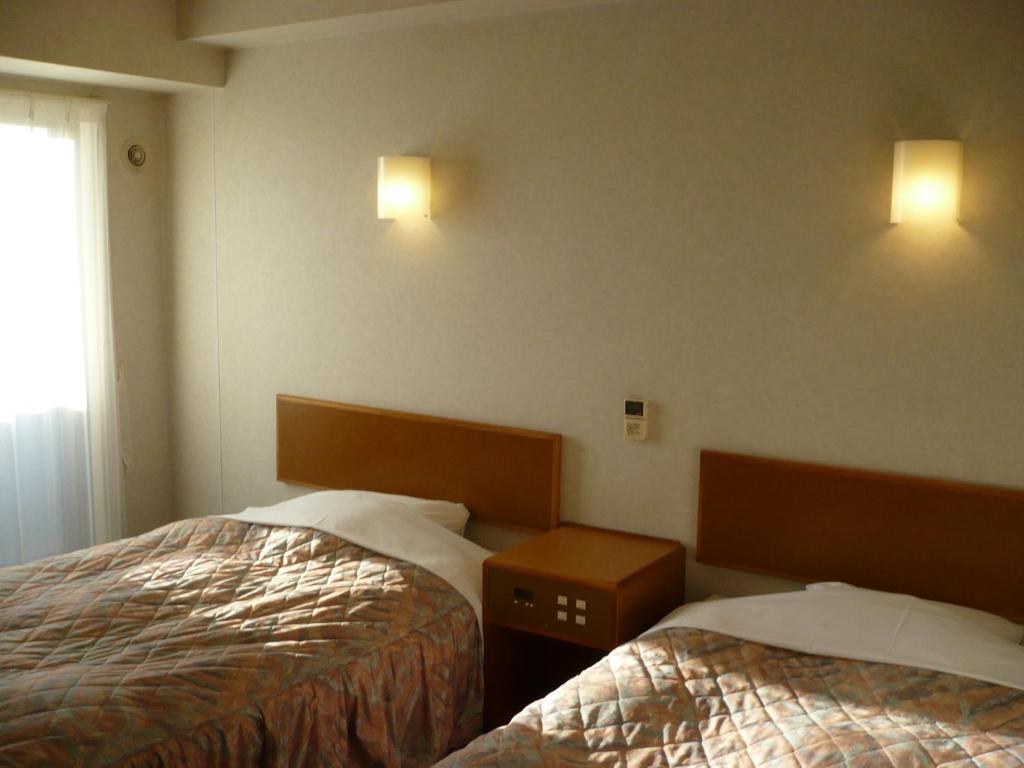 Hotel New Budget Muroran Номер фото